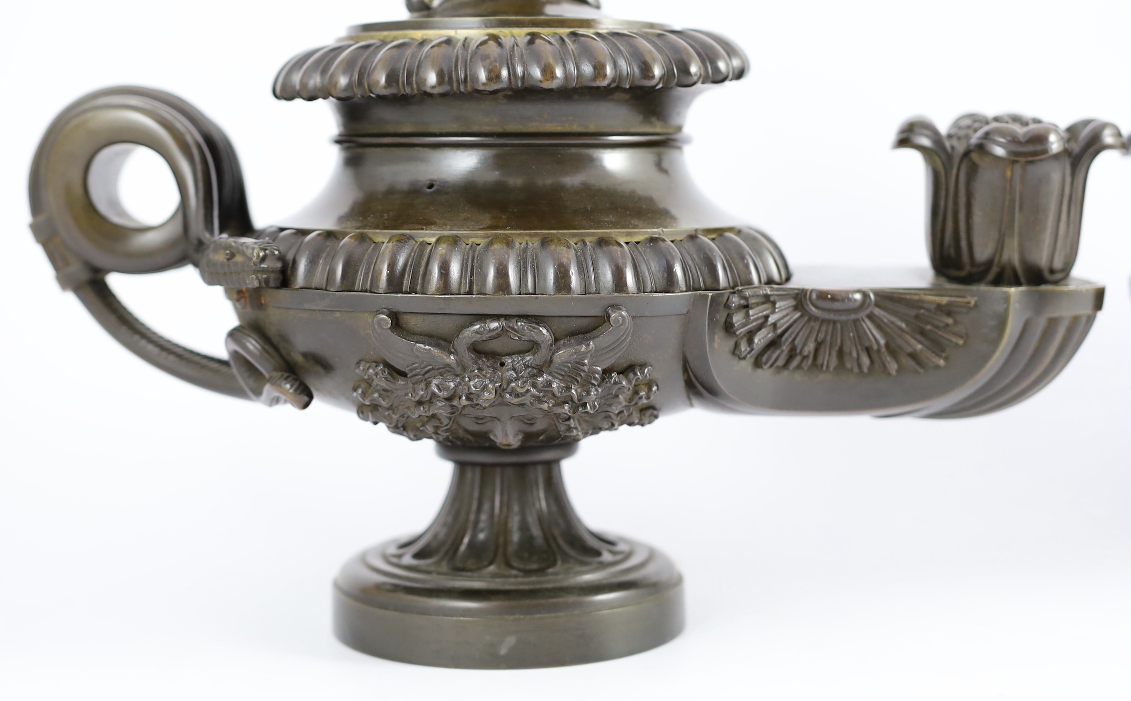 James De Ville, 367 Strand, London. A pair of Regency bronze oil lamps to a design by Thomas Hope, length 31cm depth 16cm height 25cm